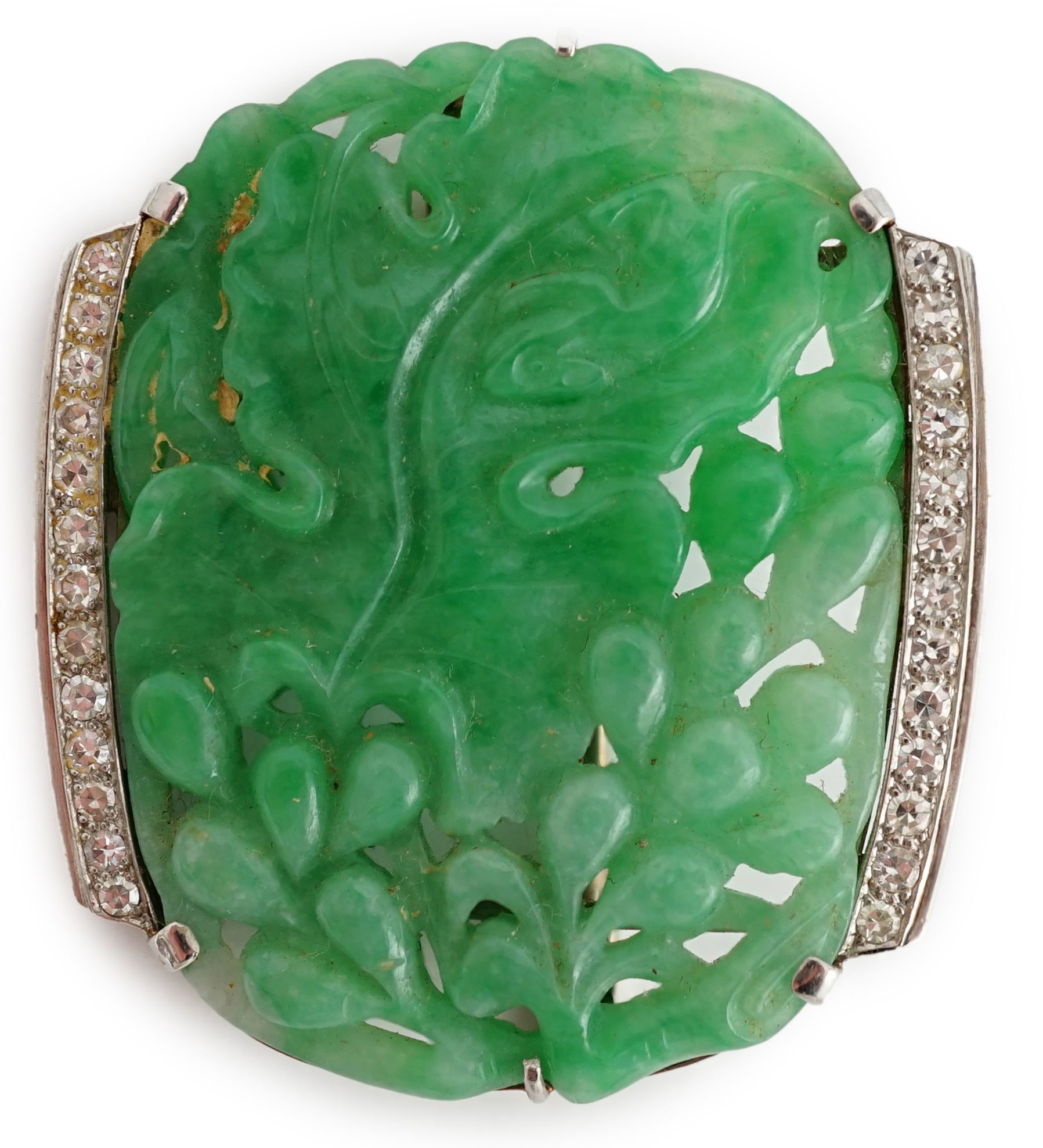 A Chinese white gold and diamond cluster set carved jade leaf and fruit brooch